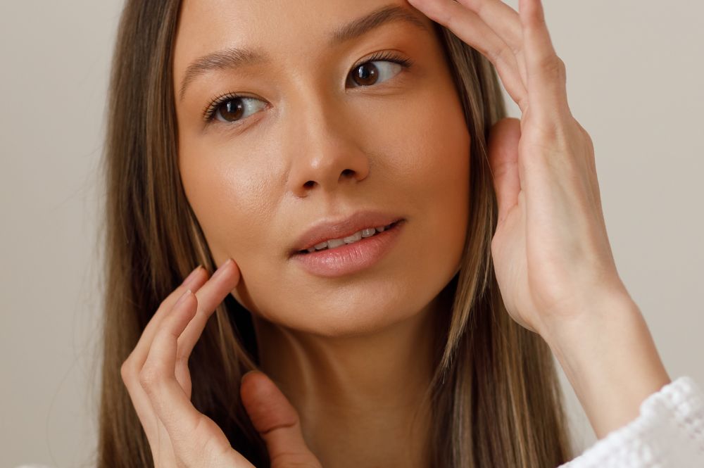 Woman shows her spotless face
