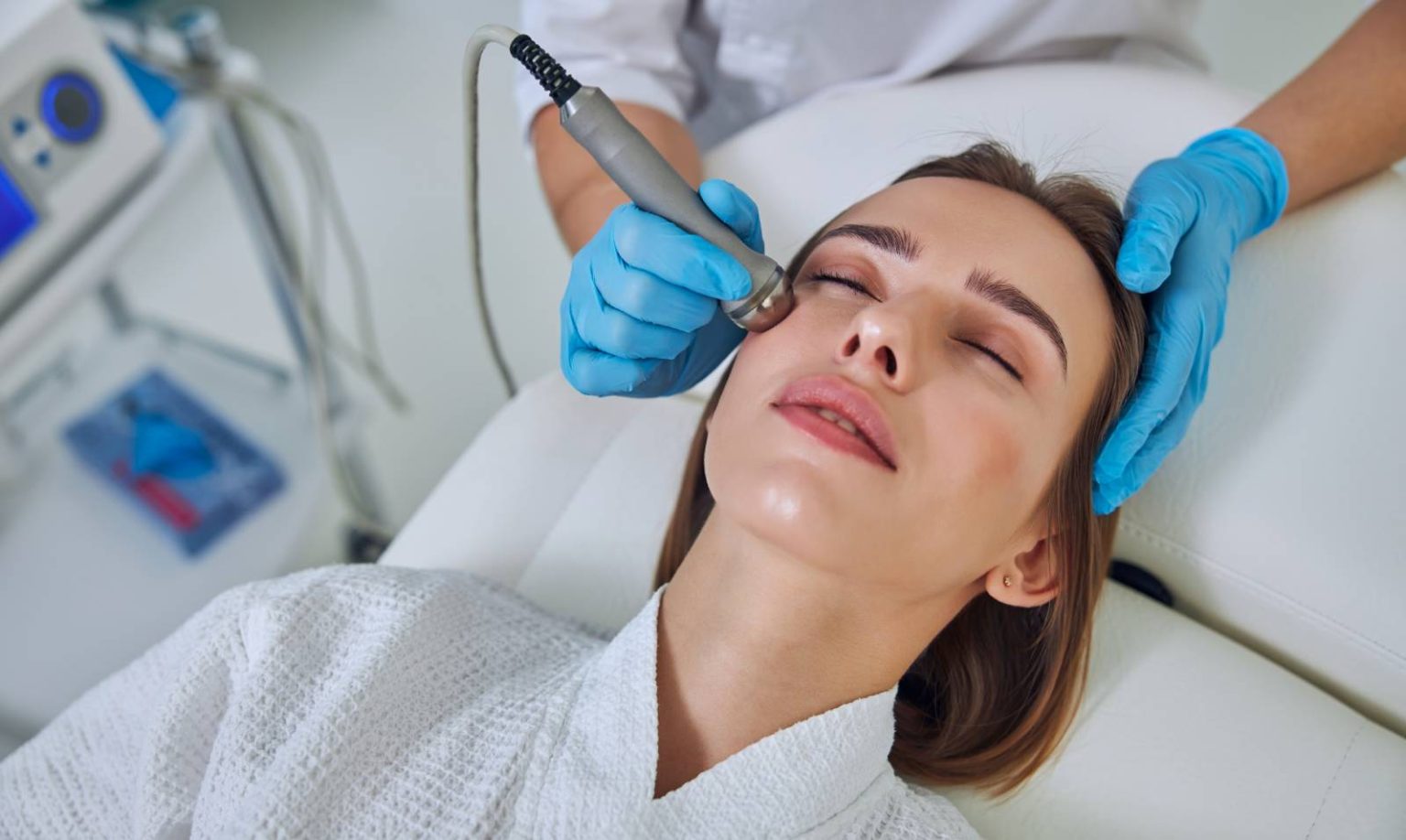 Woman receiving skin treatment
