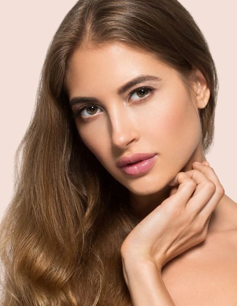 Woman showing off her flawless skin